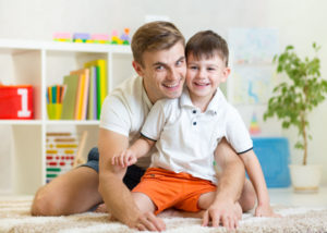 Comfort Father And Son Bonding Together Shutterstock 307216208