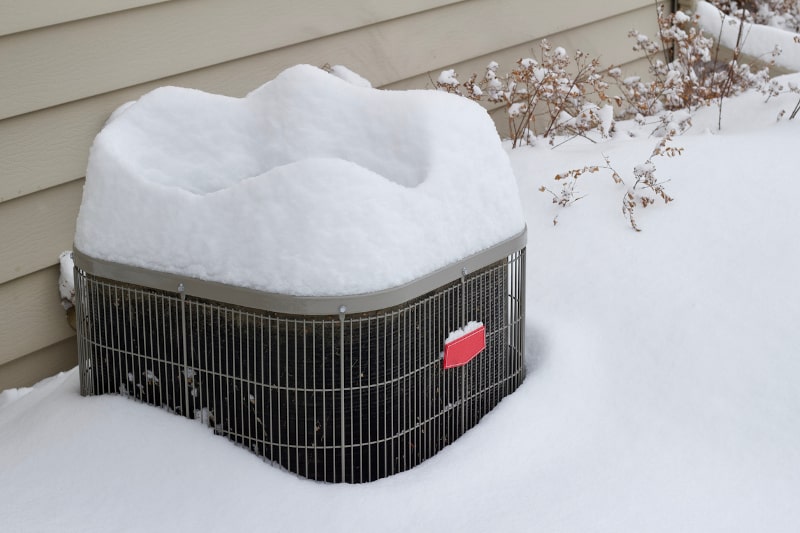 Ice and Snow Can Damage Your Heat Pump